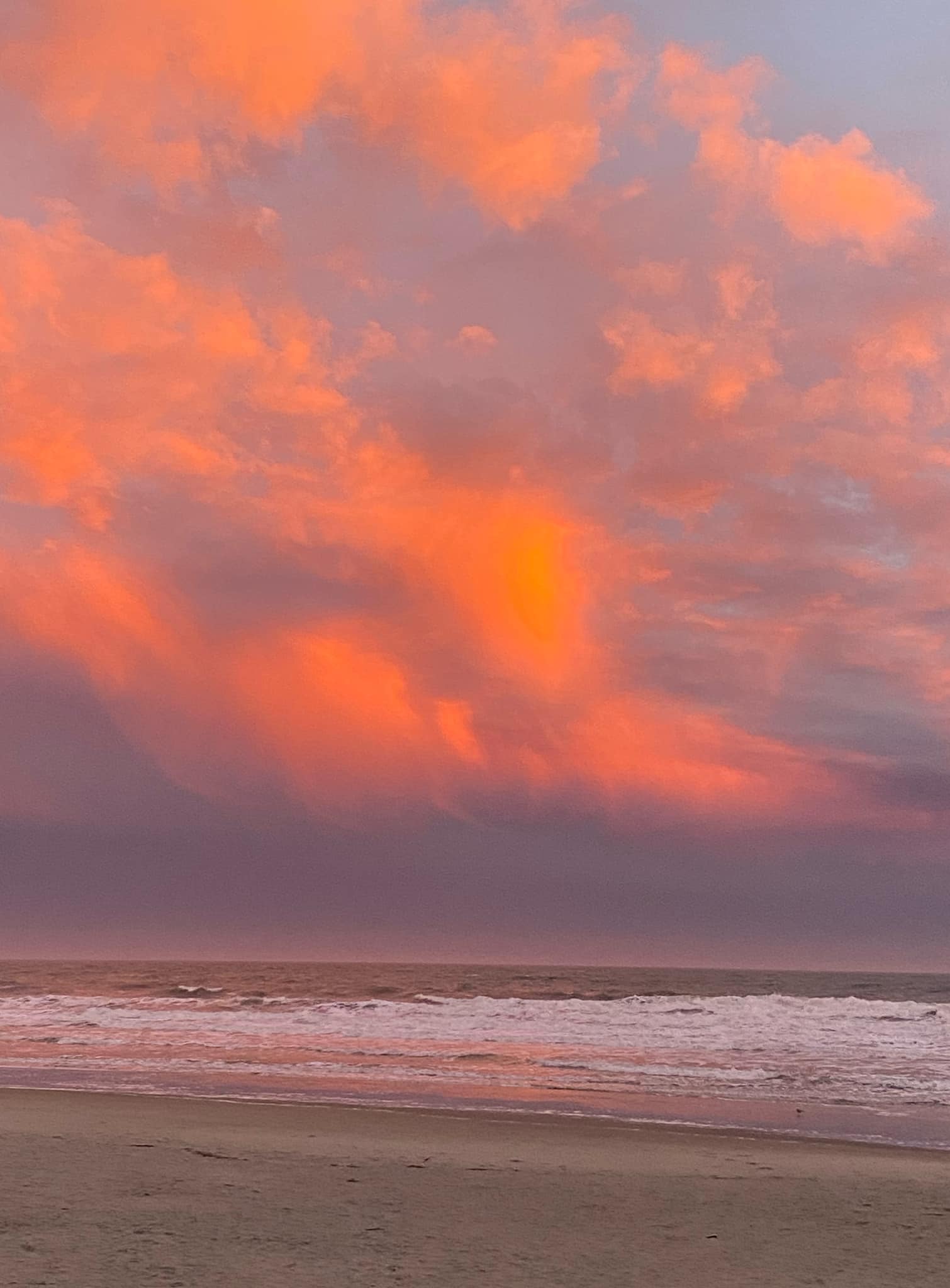 Atlantic sky ablaze in pink and orange at sunset