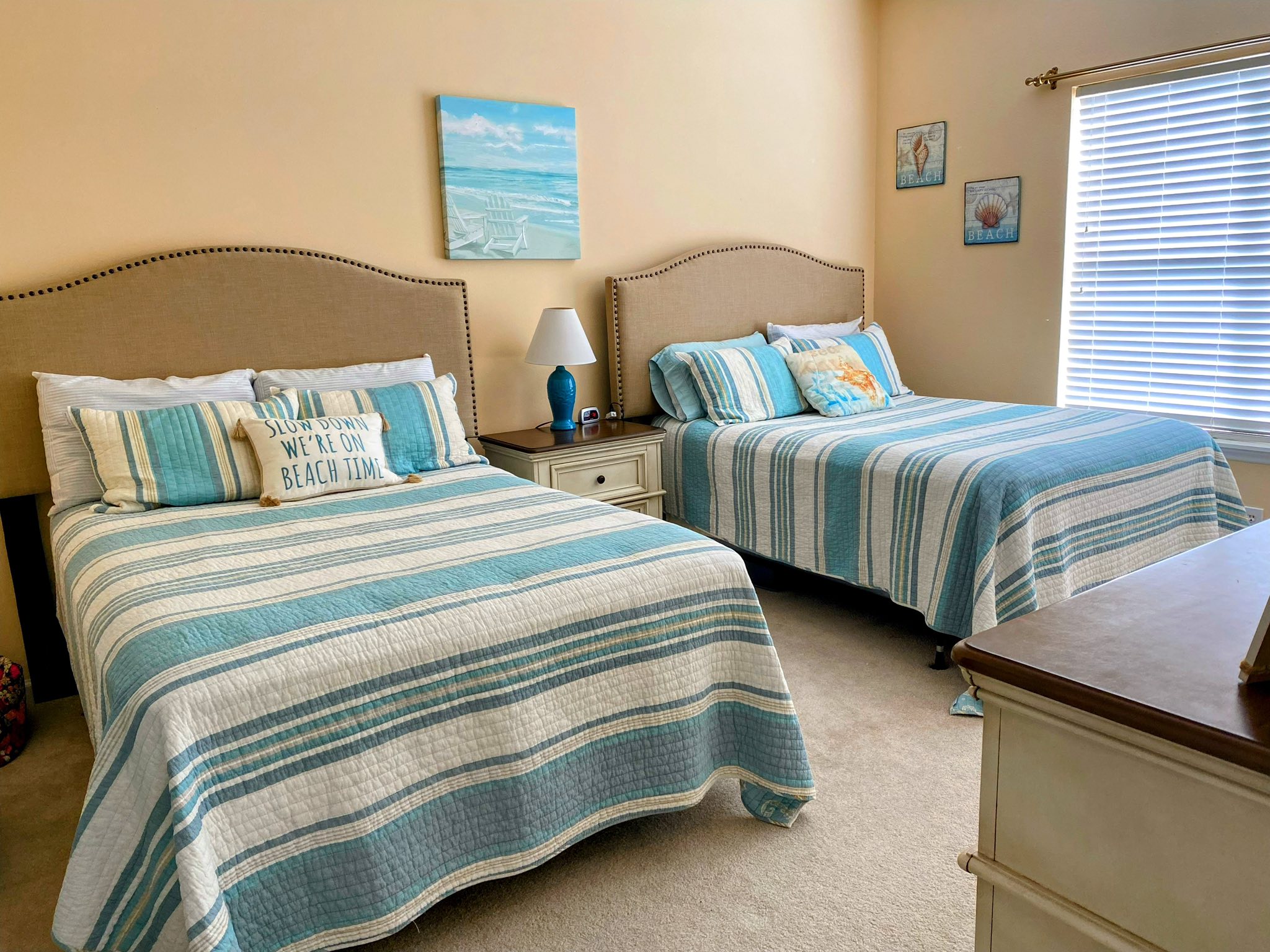 Master bedroom with two queen beds