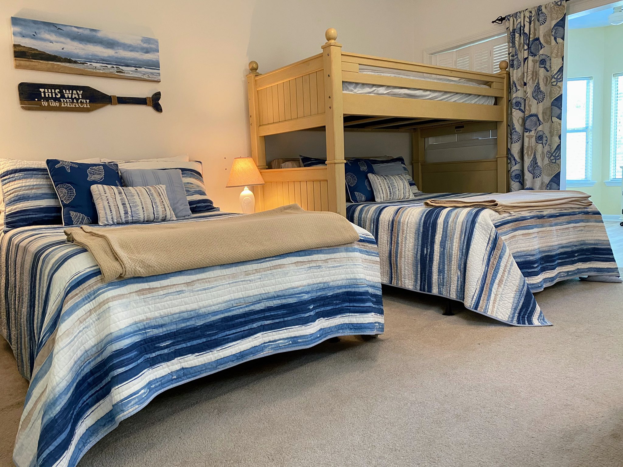 Kids' room with twin and bunk beds